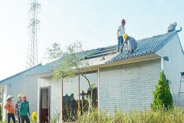 Tháo dỡ công trình xây dựng trái phép trong KCN An Dương (V. Huy)