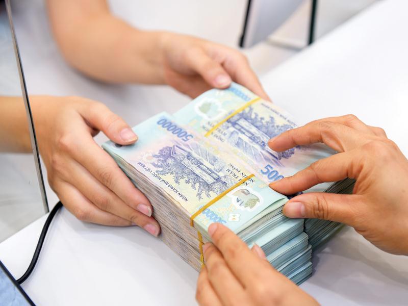 Ảnh hưởng của suy giảm kinh tế với ngành ngân hàng thường trễ hơn các ngành khác. Ảnh: Đức Thanh