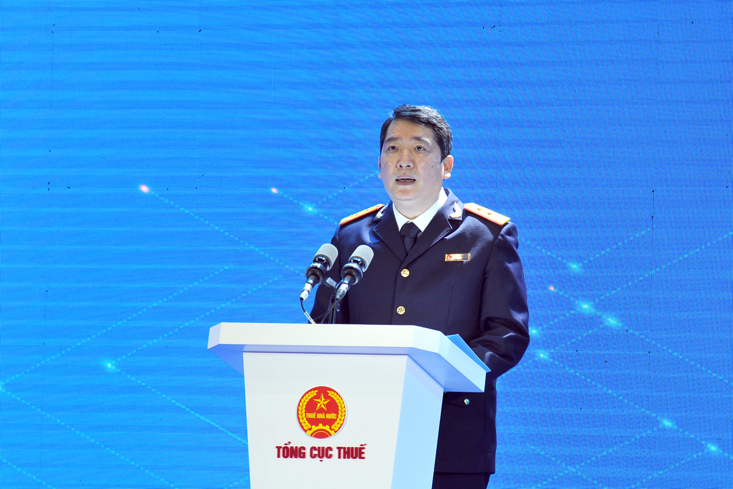 Tổng cục trưởng Tổng cục Thuế Cao Anh Tuấn cam kết tập trung triển khai hiệu quả ứng dụng Etax - Mobile và Cổng thông tin điện tử cho nhà cung cấp nước ngoài.