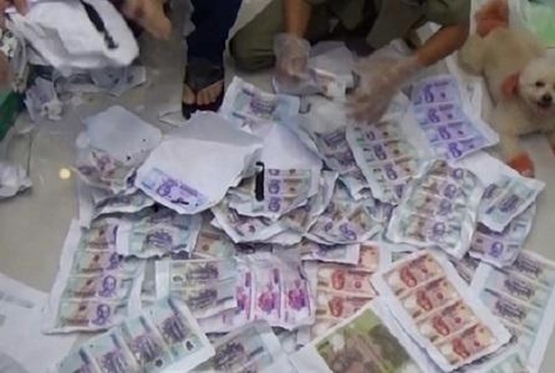 Tiền giả do cơ quan chức năng thu giữ. Ảnh: dangcongsan.vn
